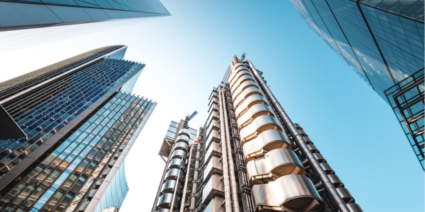 Image of skyscrapers for the blog: Where It All Started: Lloyd’s Reopens To Face To Face Trading, But Where Did It All Begin?