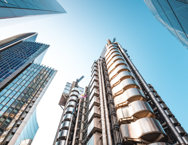 Image of skyscrapers for the blog: Where It All Started: Lloyd’s Reopens To Face To Face Trading, But Where Did It All Begin?